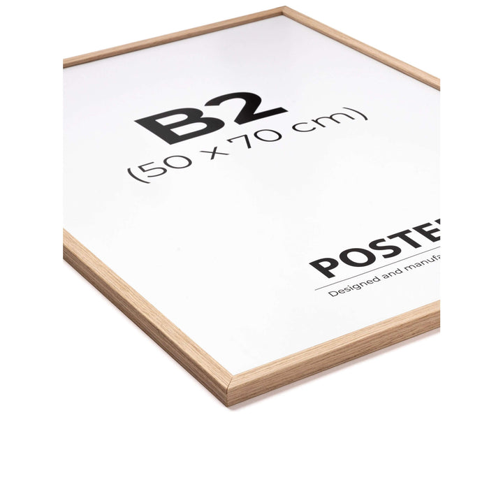 Egetræsramme i størrelse 50x70 cm fra Postera